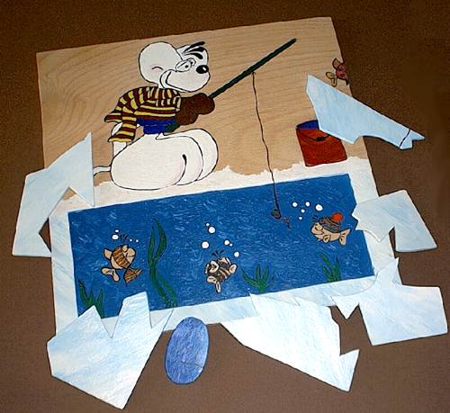 Mauspuzzle in Einzelteilen